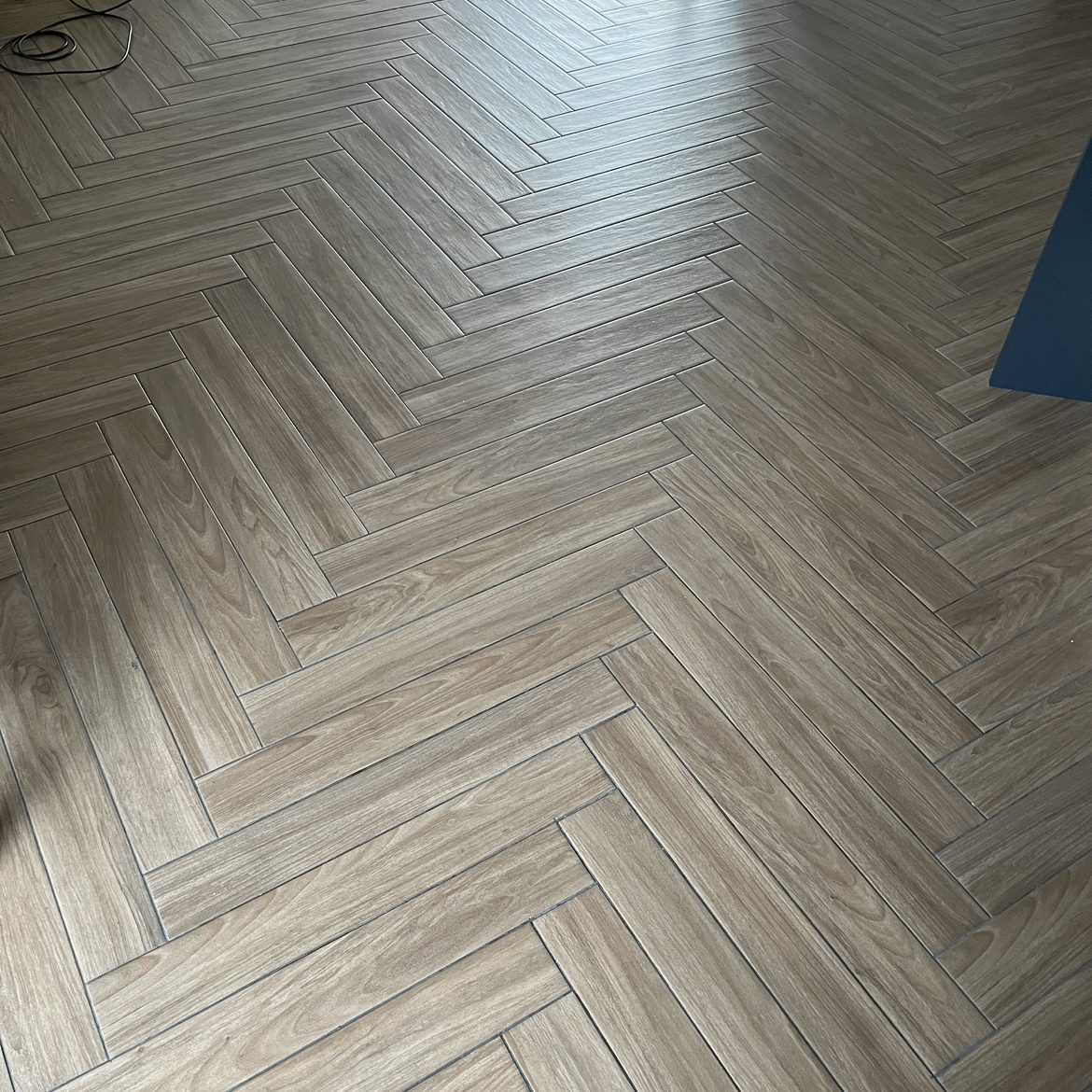 Parquet style tiles in living room